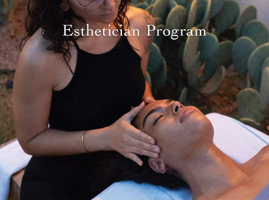 Esthetician Program: esthetician giving a facial massage to a reclining client outdoors with cactus backdrop
