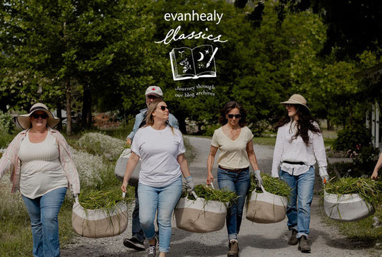Five people carrying baskets of plants on a path with overlaid text ‘evanhealy classics — Journey through blog archives’