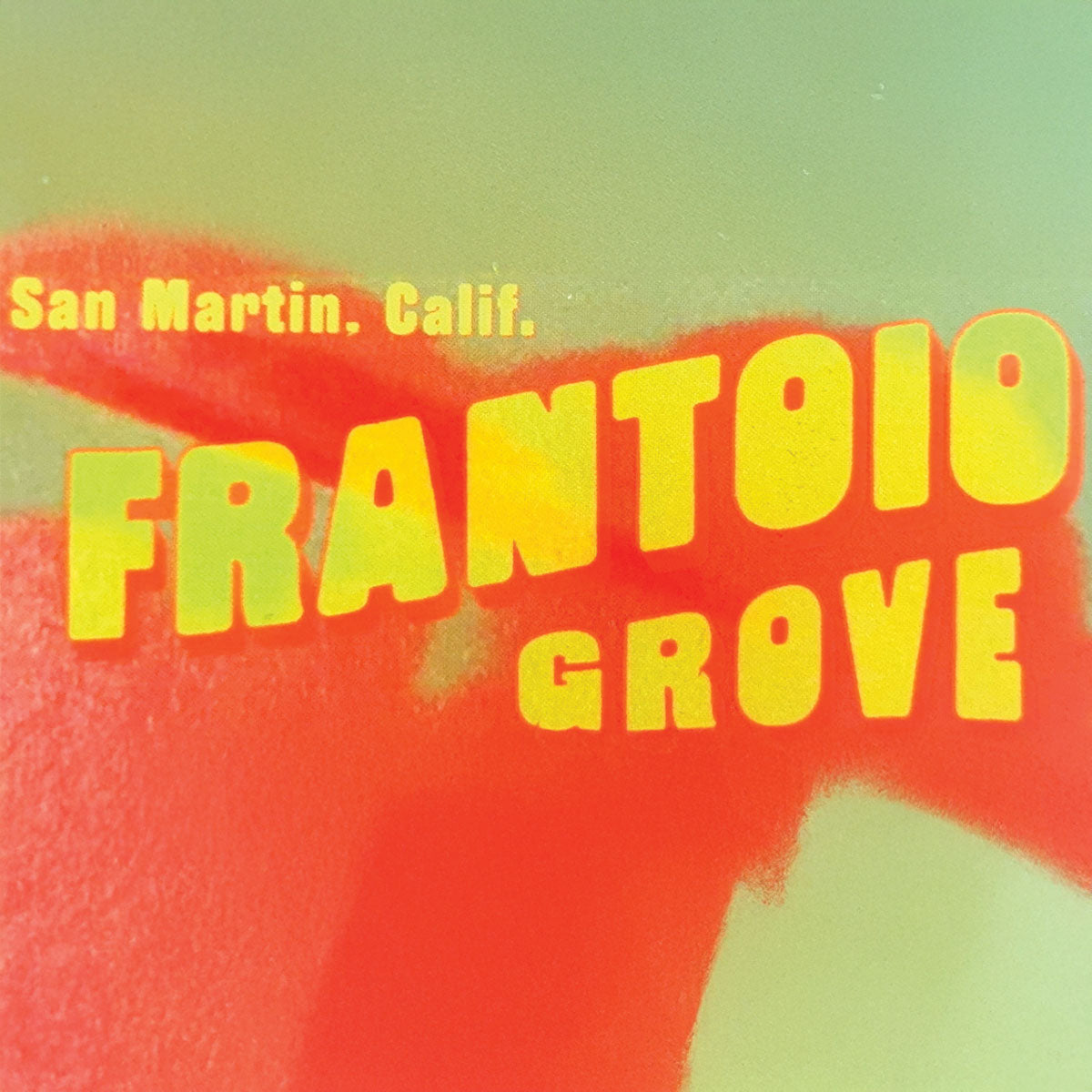 Close-up of Frantoio Grove sticker with large yellow text FRANTOIO GROVE and small text San Martin, Calif. on red-green gradient background