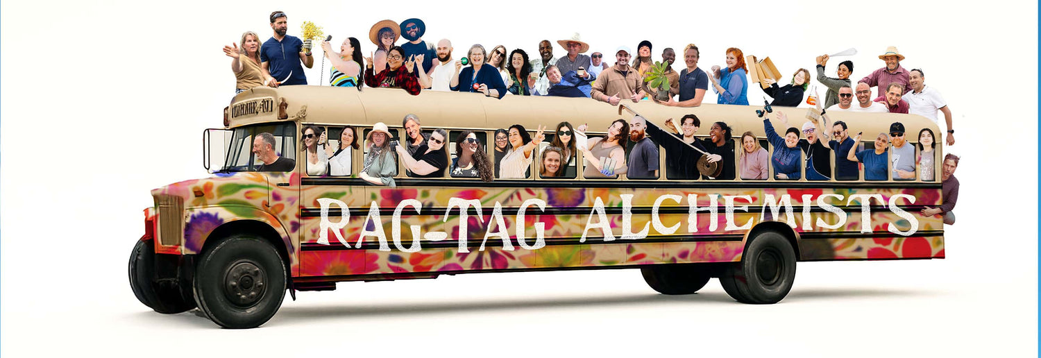 Team collage riding a colorful painted bus with large headline text RAG-TAG ALCHEMISTS representing company team and culture