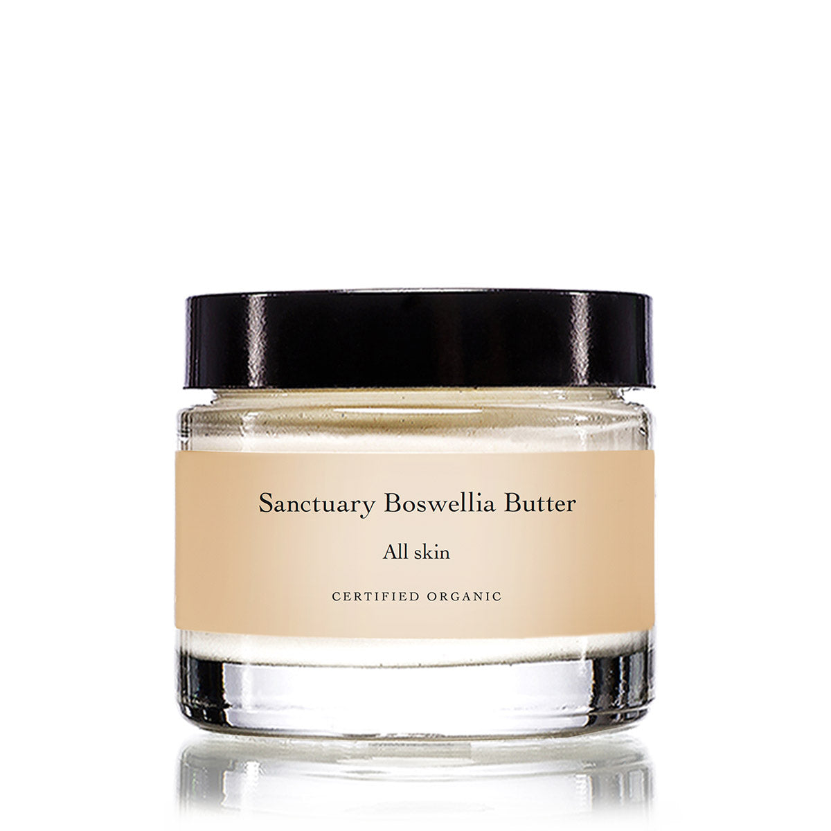 Front view of Sanctuary Boswellia Butter moisturizer showcasing its cream-colored jar and black lid on a white background