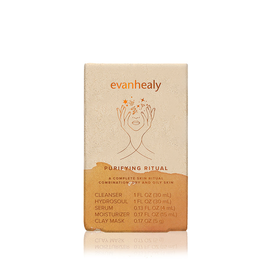 Front view of evanhealy Purifying Ritual Blemish Line starter box showcasing botanical face artwork against a white background