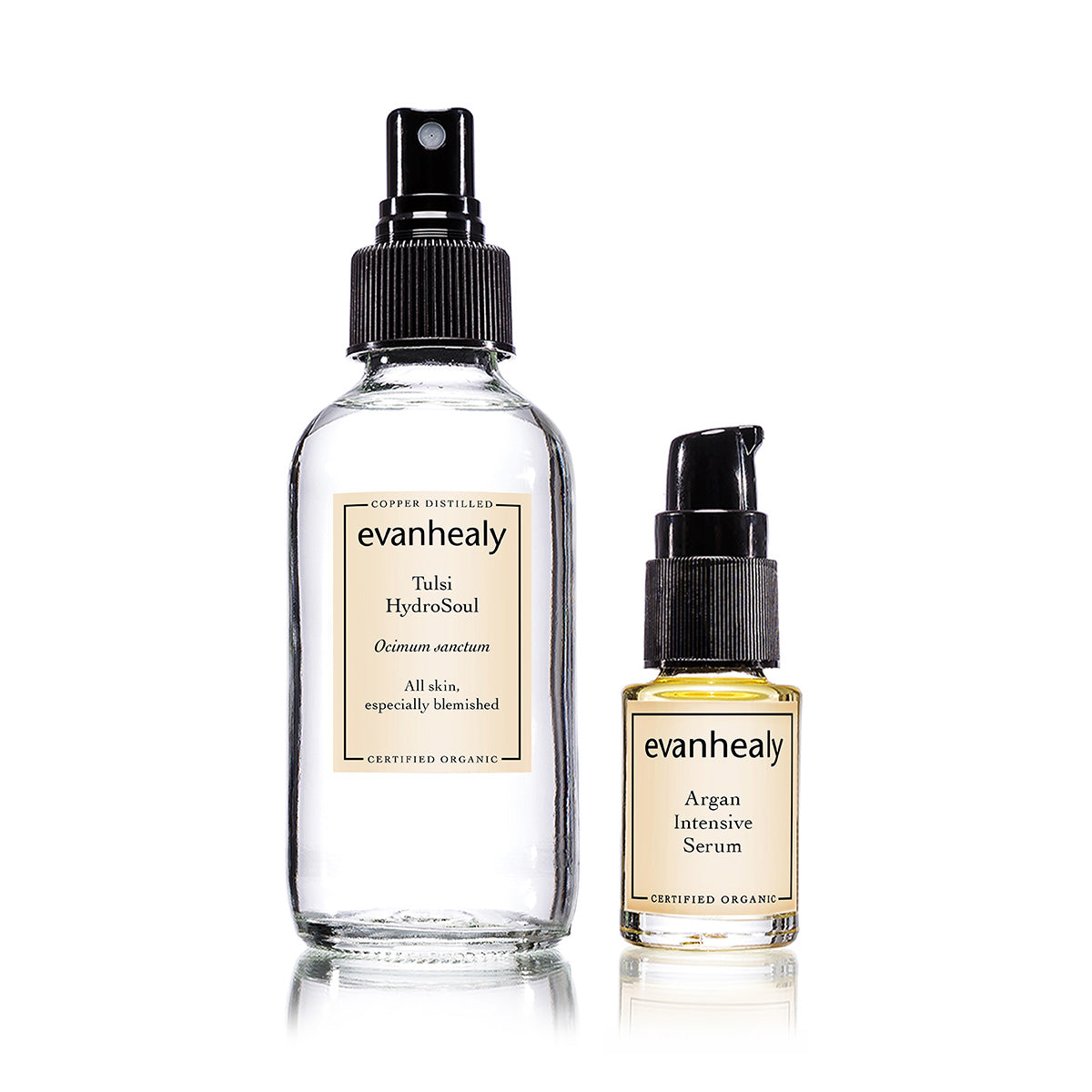 Front view of Nourishing Duo showing Tulsi Hydrosol spray bottle and Argan Intensive Facial Serum on white background