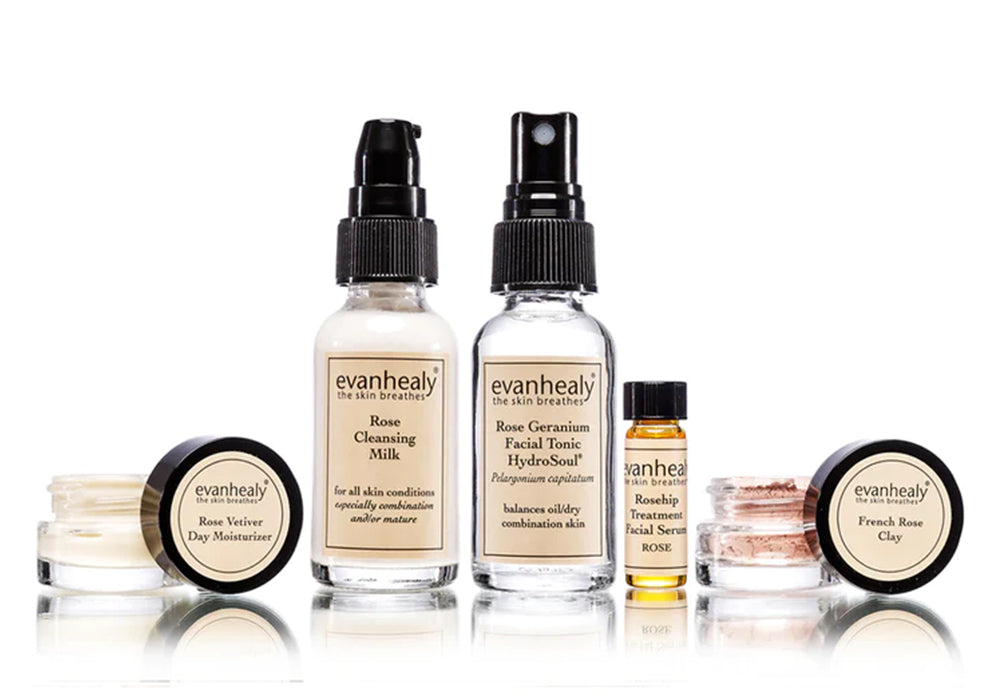 Front view of Balancing Starter set showcasing travel sized glass bottles and jars with cream labels on white background