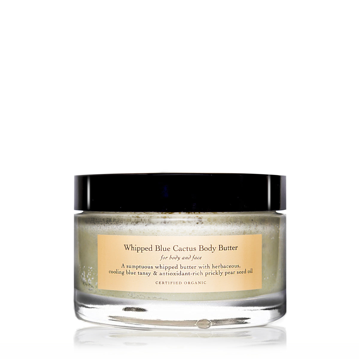 Front view of Whipped Blue Cactus Body Butter in a clear jar with black lid, showing pale whipped butter on white background