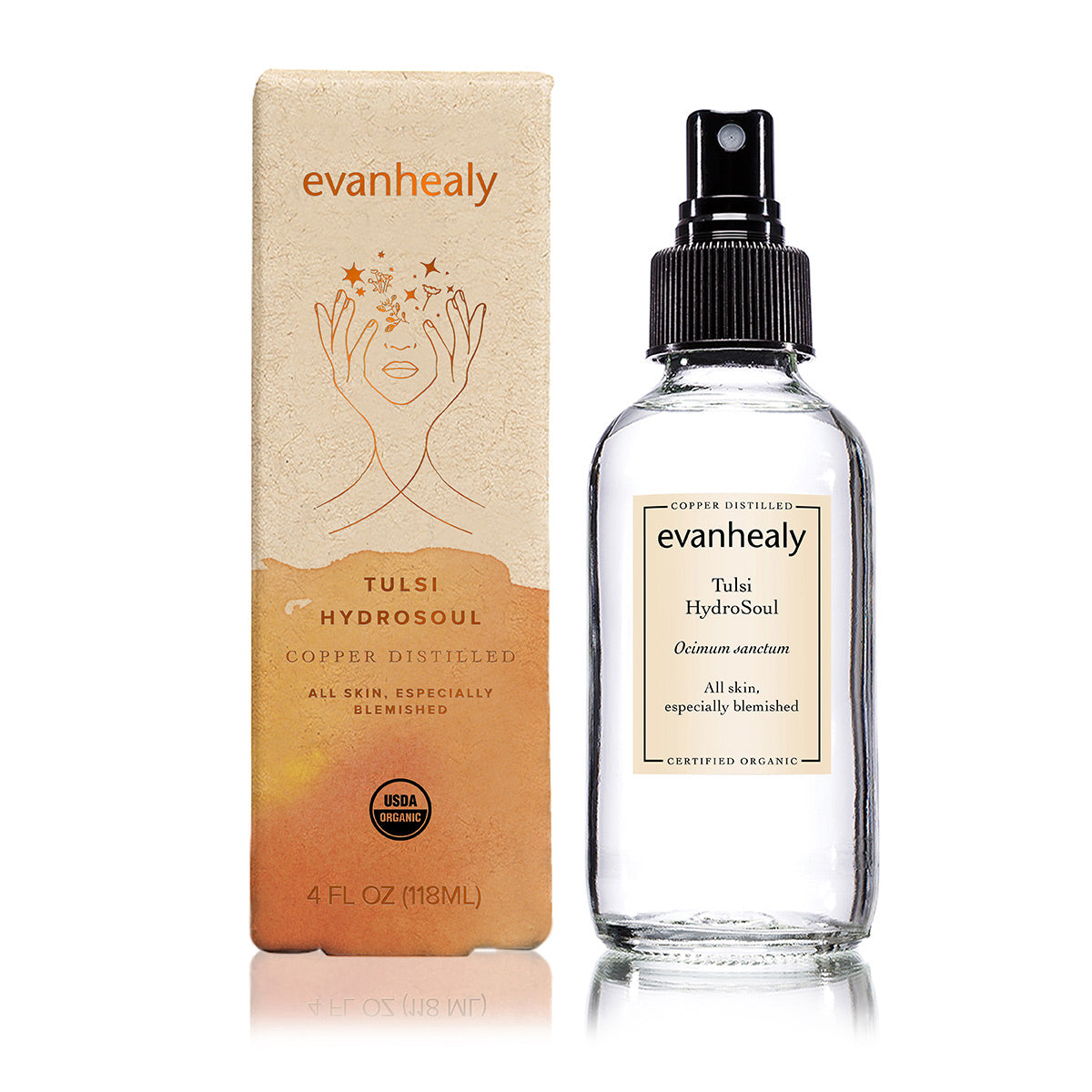 Front view of Tulsi HydroSoul facial tonic showcasing copper distilled packaging with box and spray bottle on a white background